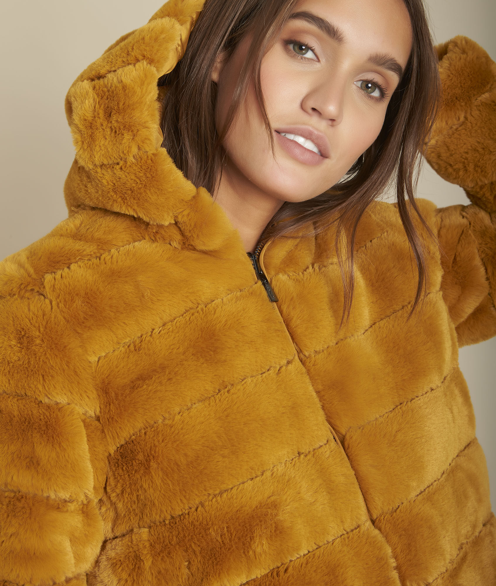 long ochre faux fur coat