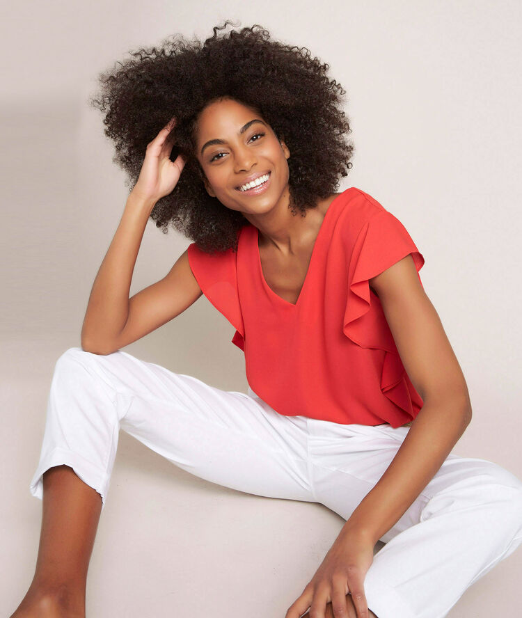 Elfie red ruffled top flame.