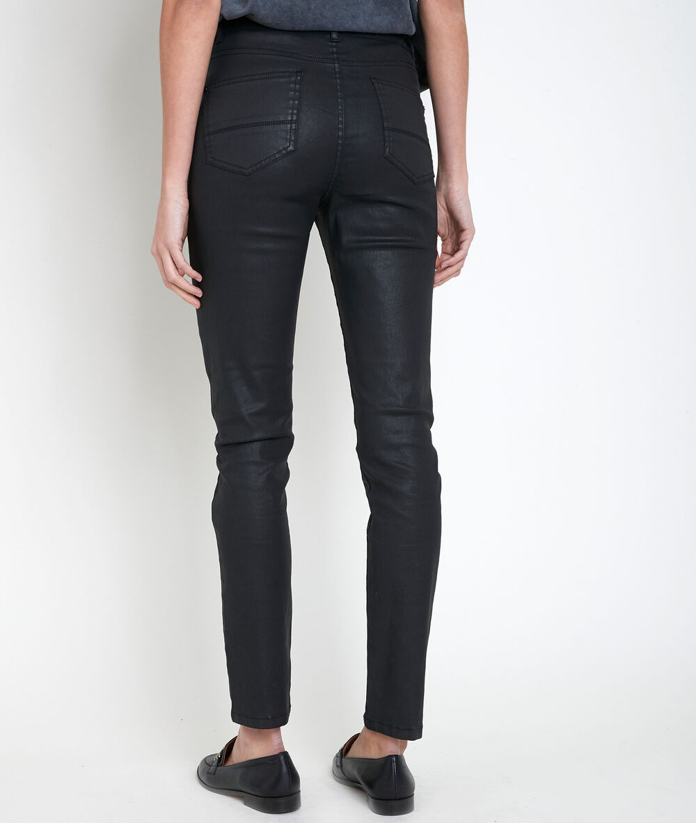 Sultan, the iconic slim-fit coated jeans noir.