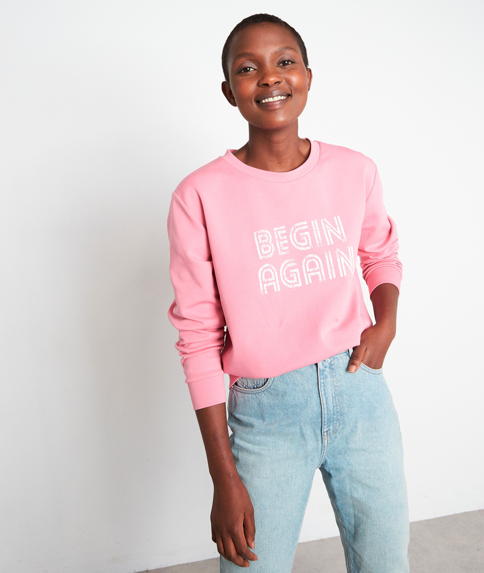 pink slogan jumper