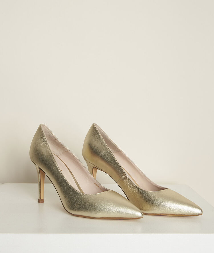 Kelly gold leather high heels white gold.