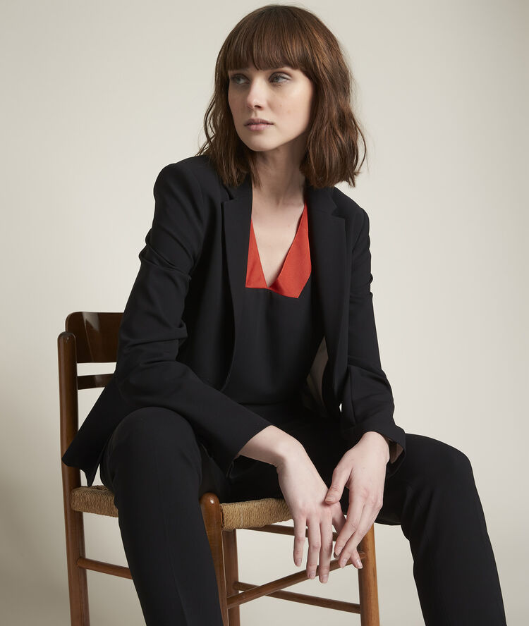 Elisa black two-fabric top vibrant orange.