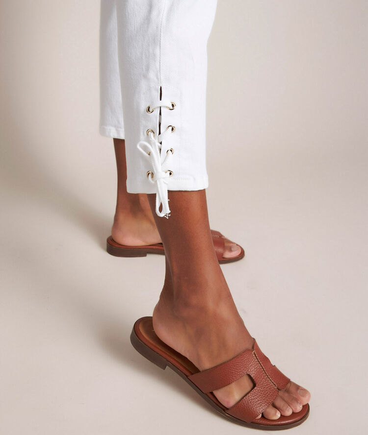 Agathe, the iconic white laced slim jeans white.