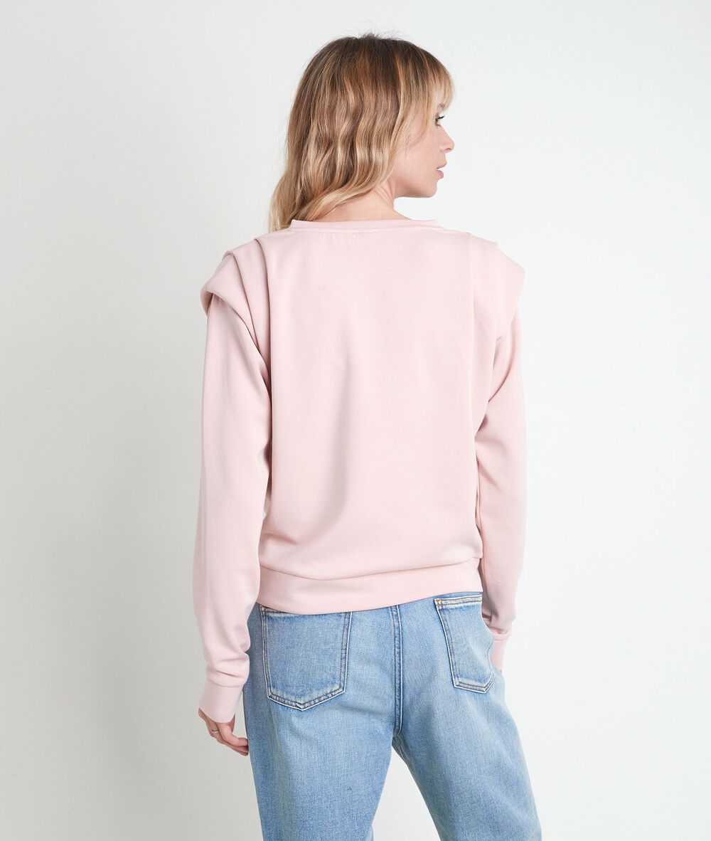 Ice pink sweater with shoulder pads rose.