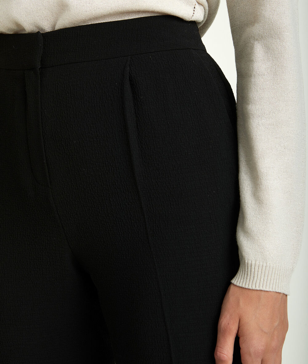Isaure crêpe trousers black.