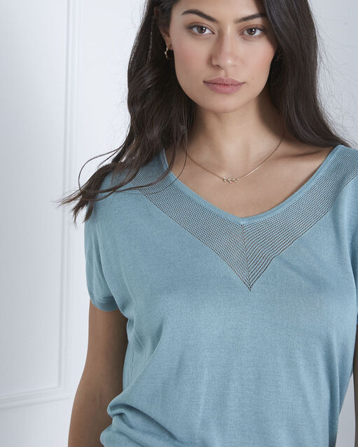 Never blue pullover with neckline detailing ice green.