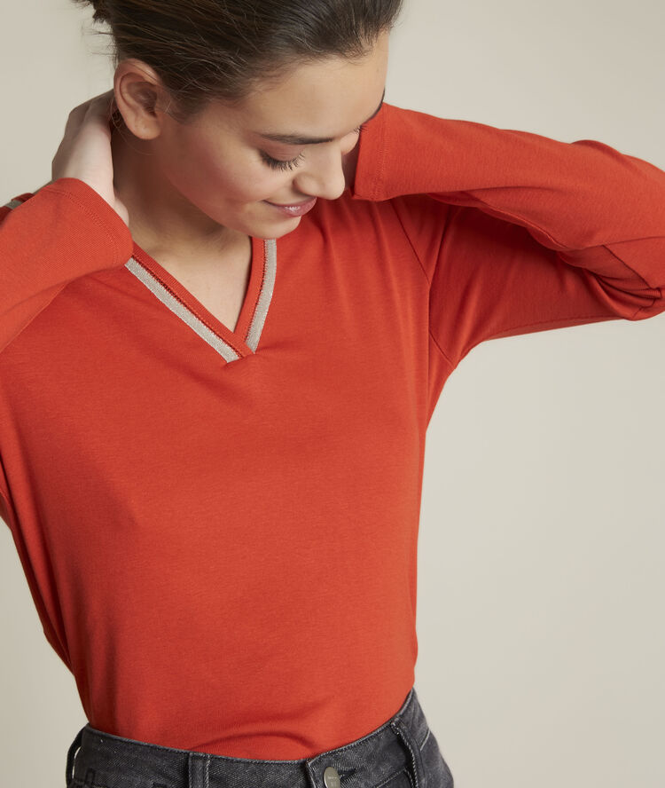 Rabat orange t-shirt with a henley neck vibrant orange.