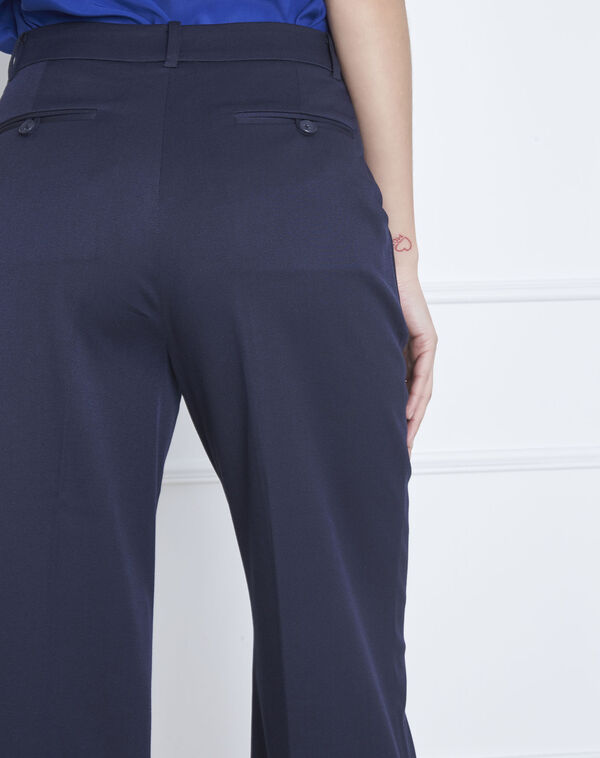 Gabin loose fit blue trousers with creases navy.
