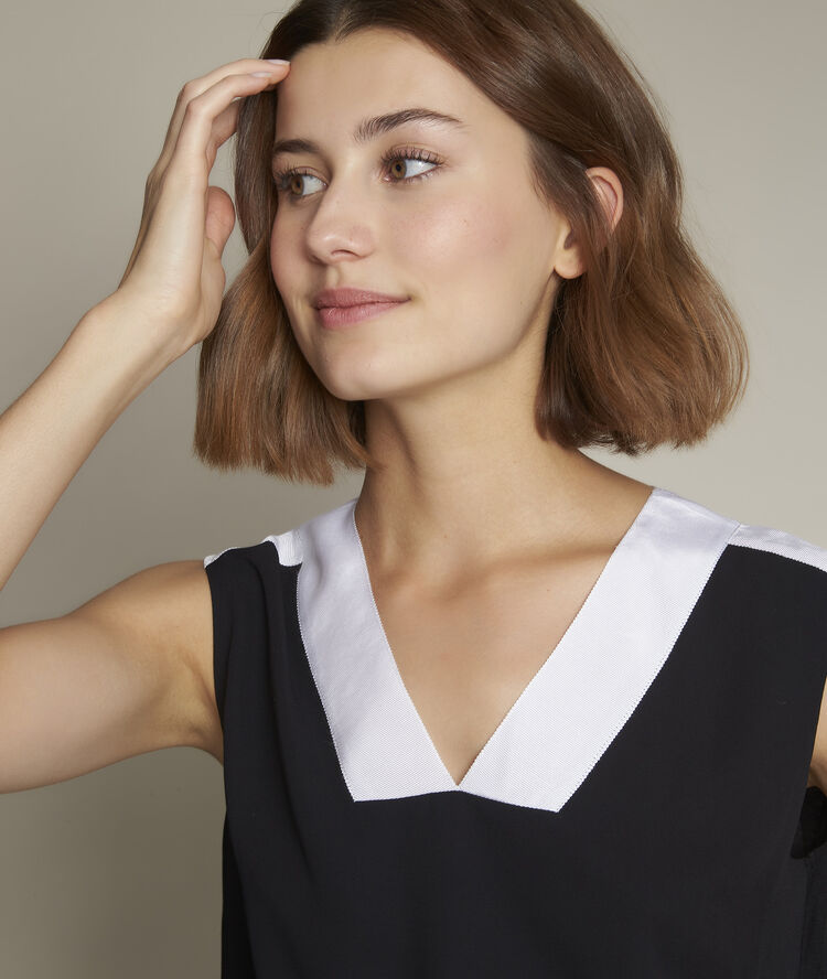 Elisa black dual-material top white.