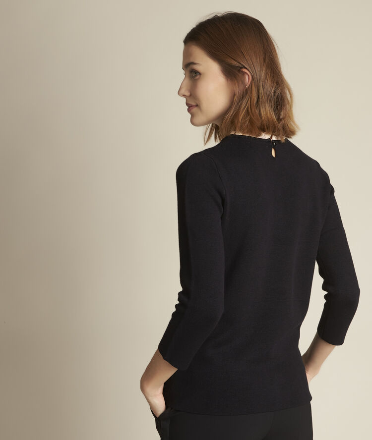 Declic ottoman jumper with decorative collar black.