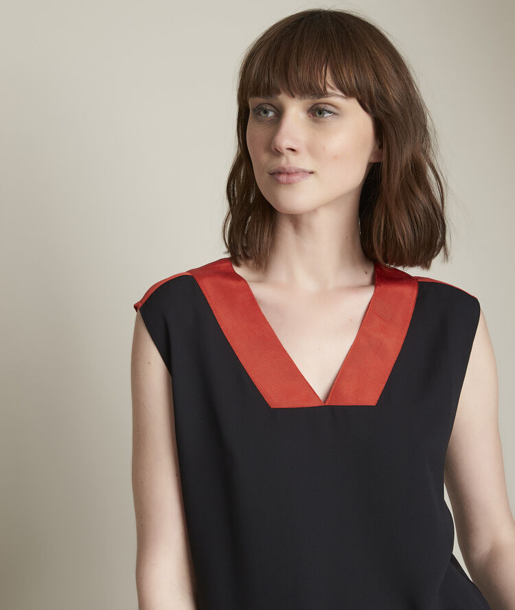 Elisa black two-fabric top vibrant orange.