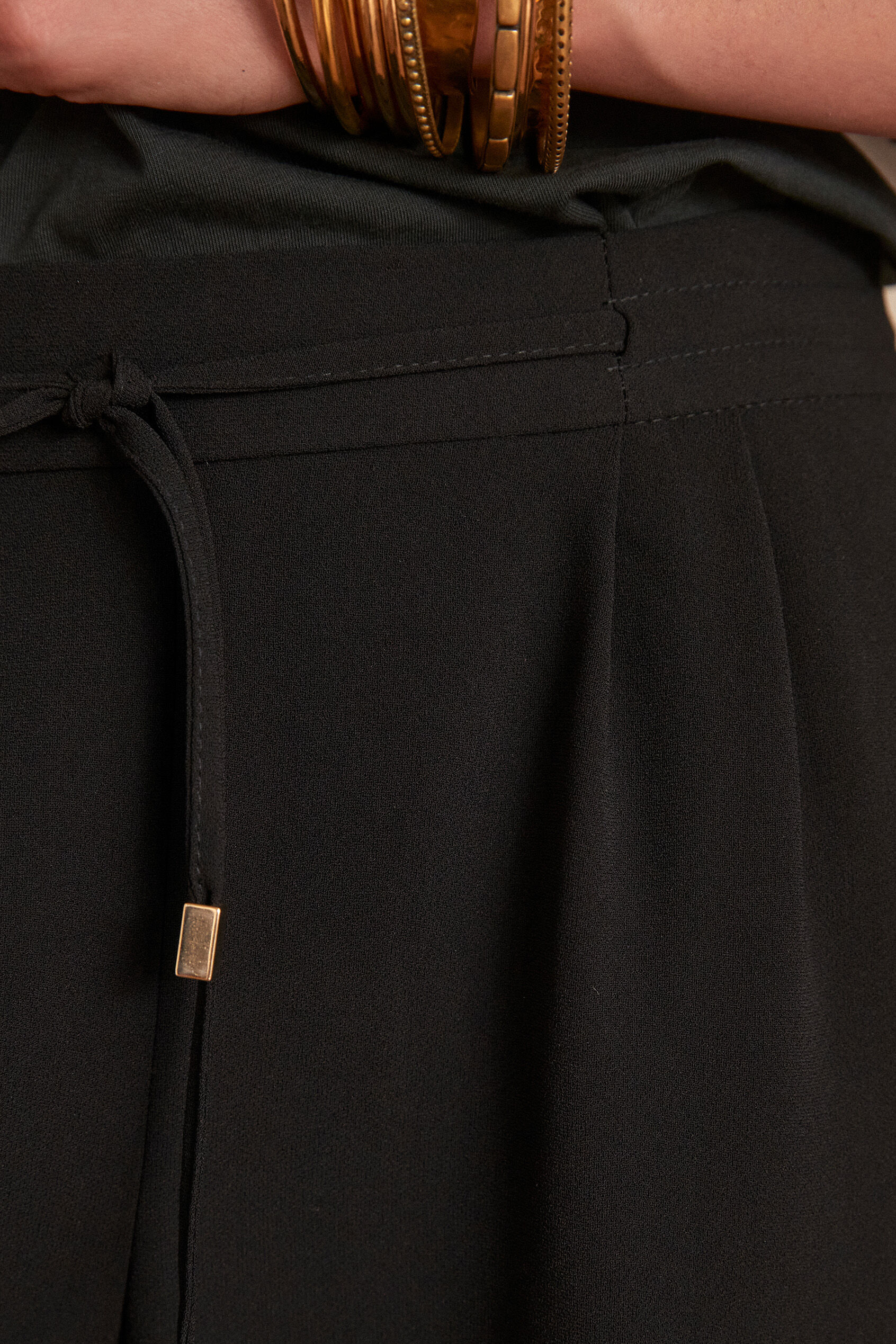 Flynn black crepe loose-fit trousers 