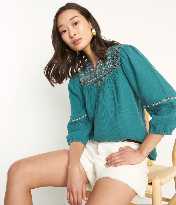 Lydie teal embroidered cotton blouse.