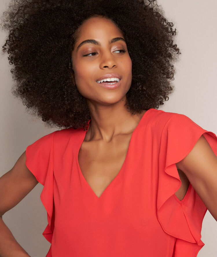 Elfie red ruffled top flame.