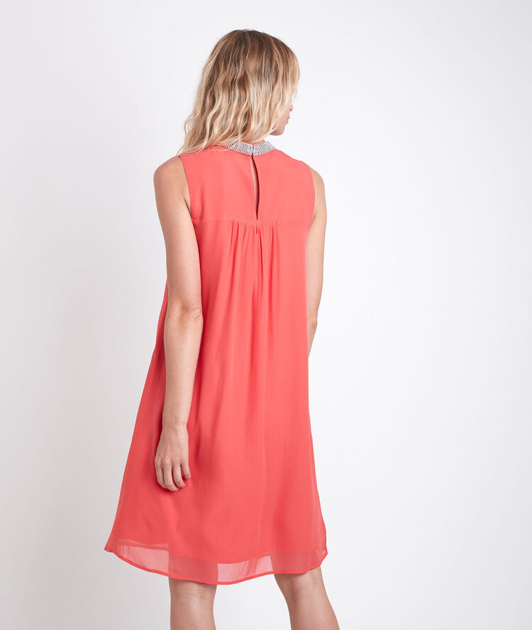Oraure flowing coral dress with rhinestone coral.