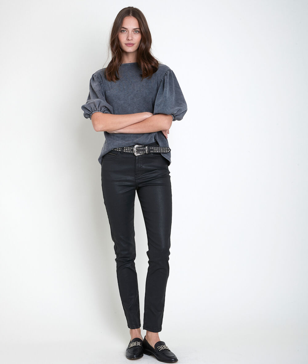 Sultan, the iconic slim-fit coated jeans noir.
