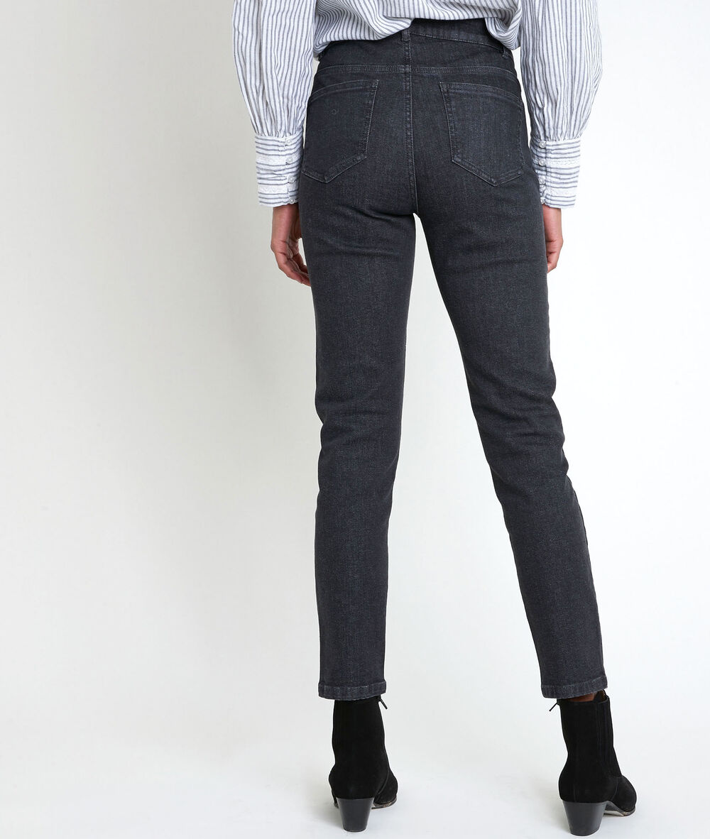 The iconic canelle black studded slim-fit jeans noir.