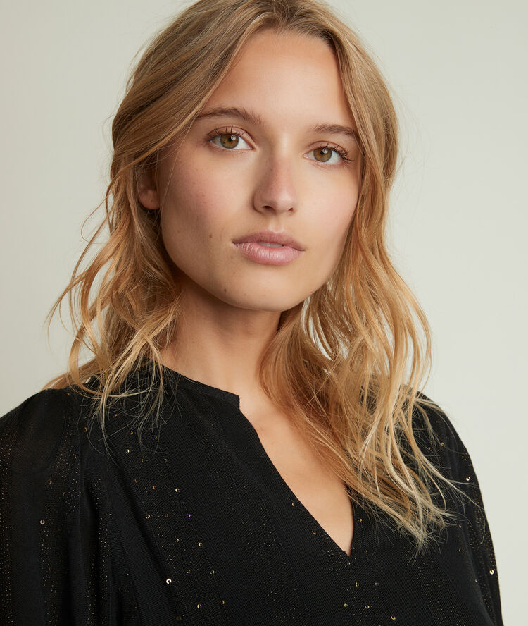 June sequinned blouse.