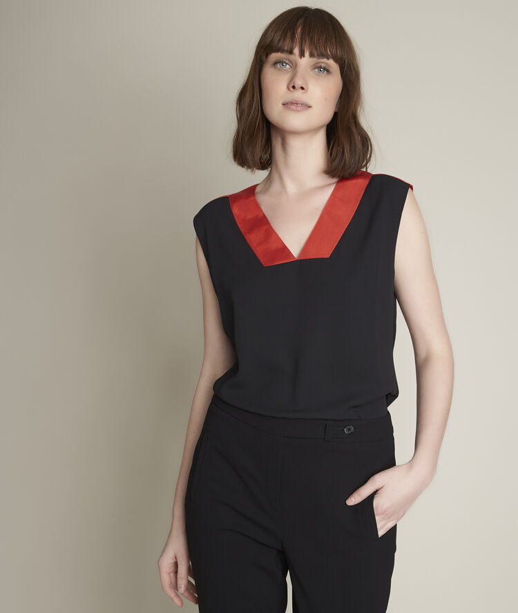 Elisa black two-fabric top vibrant orange.