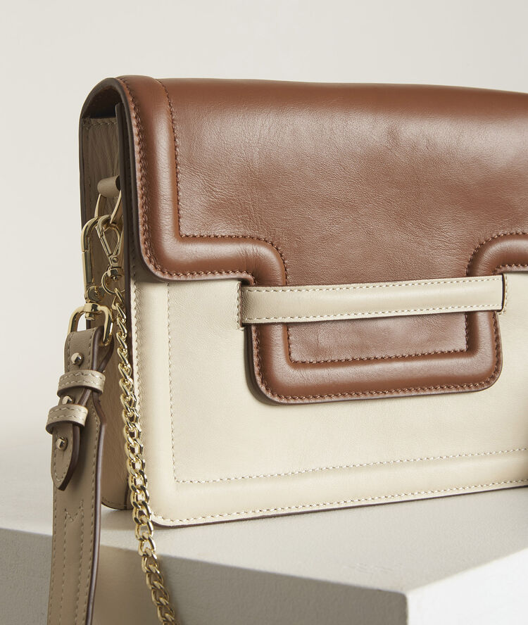 The 123 in twotone leather string.