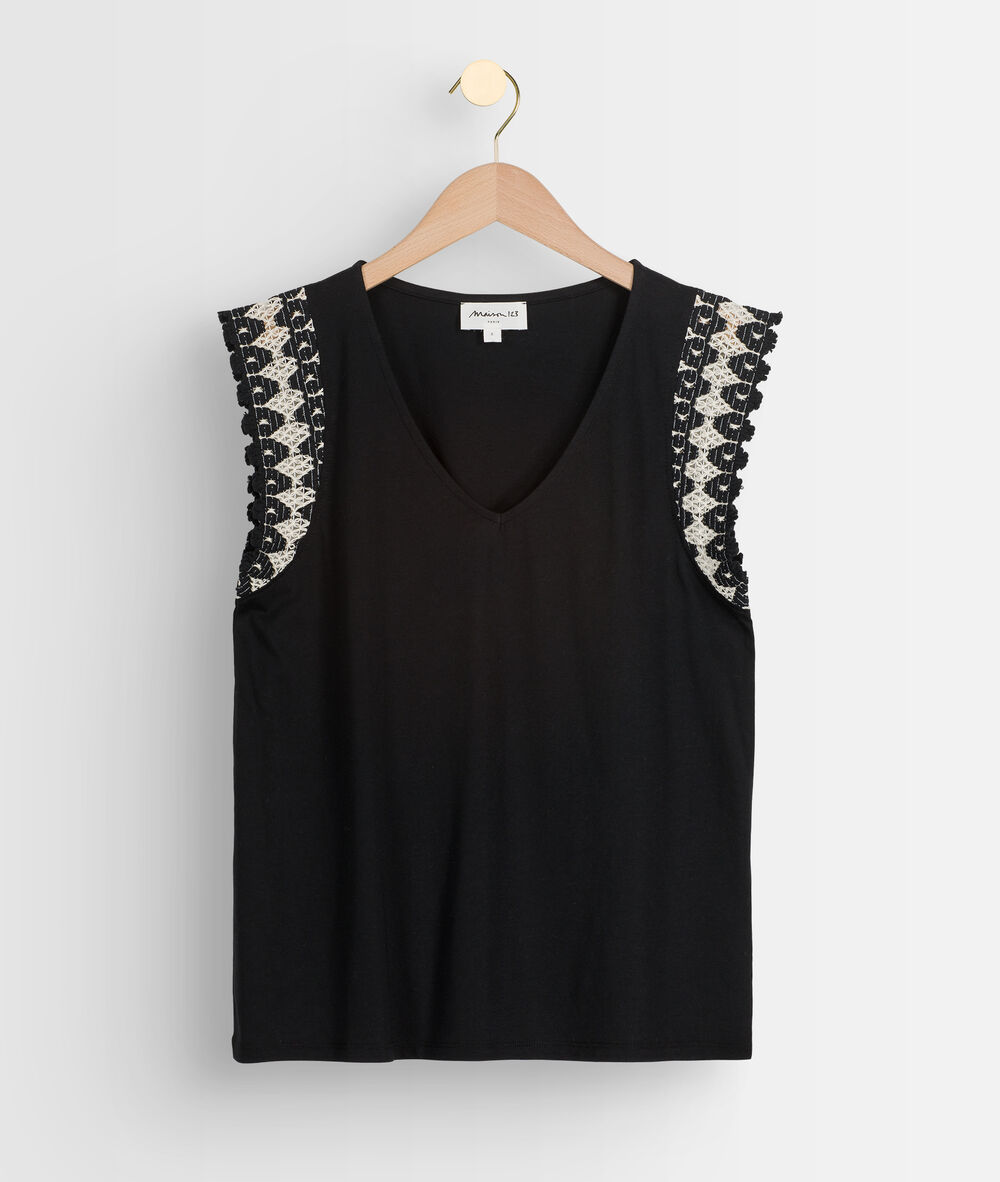 Ippie top with decorative armholes noir.