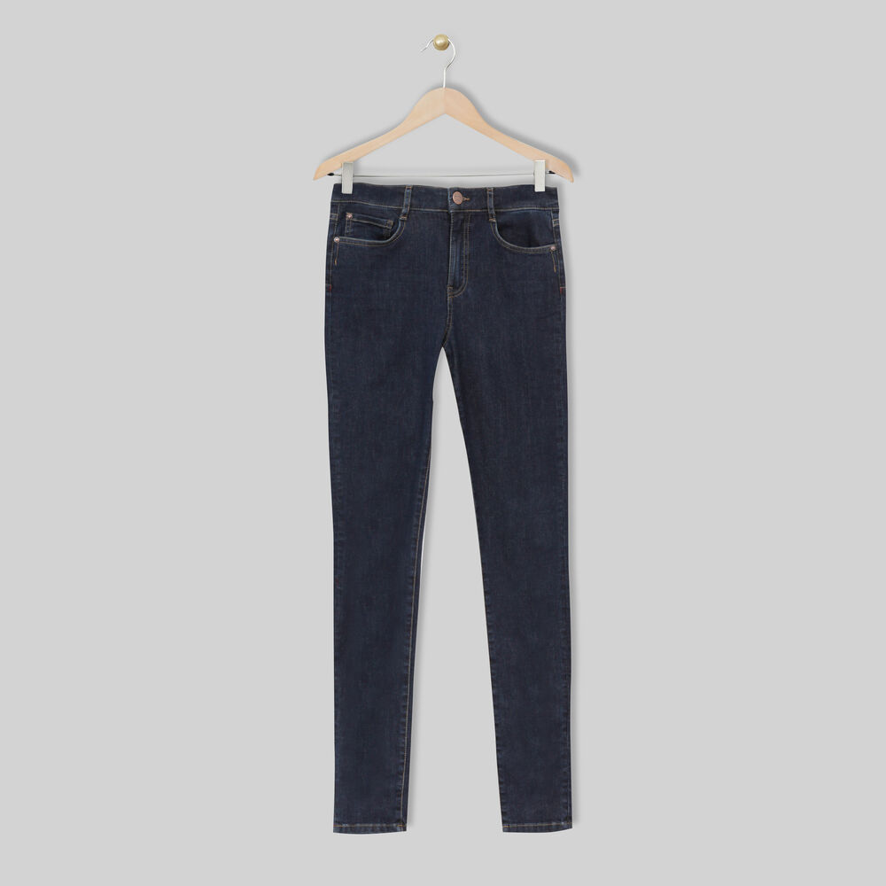 Suzy, the iconic slim-fit raw used jeans raw denim.