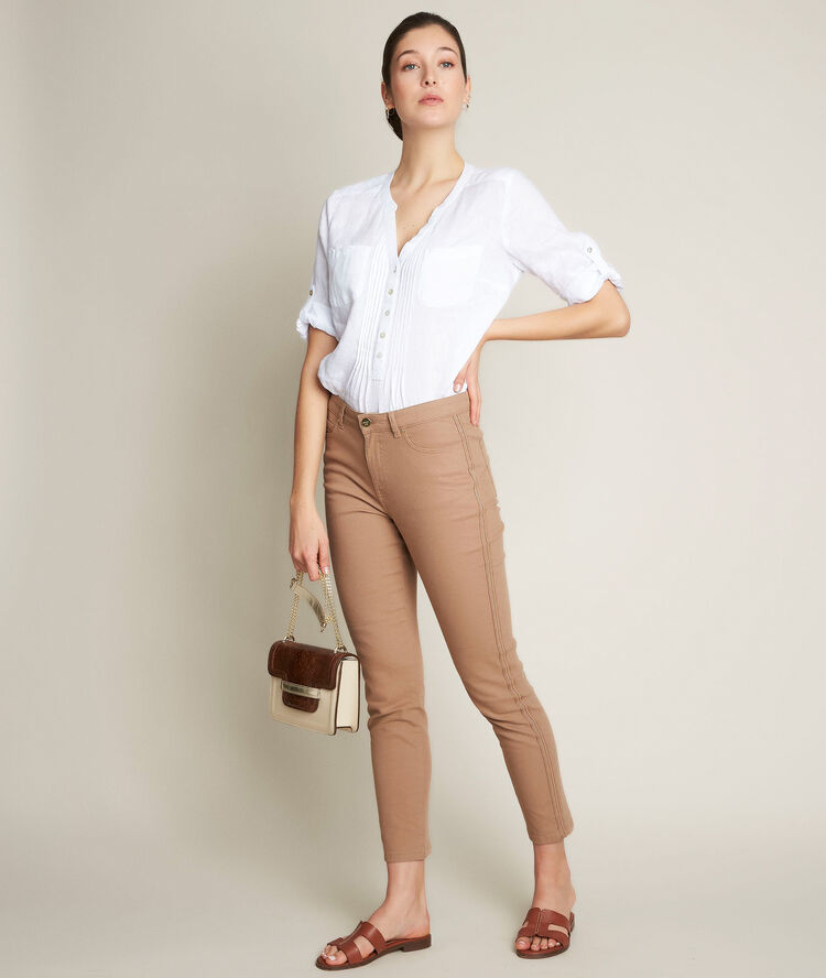 Aurore, the iconic beige slim-fit trousers with jewelled band havana brown.