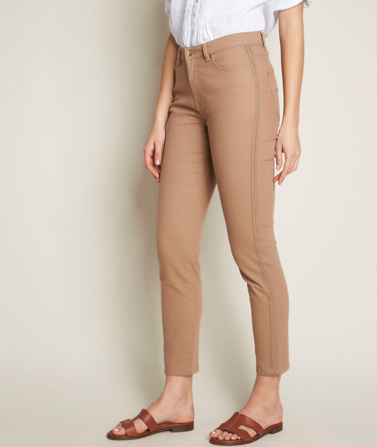 Aurore, the iconic beige slim-fit trousers with jewelled band havana brown.