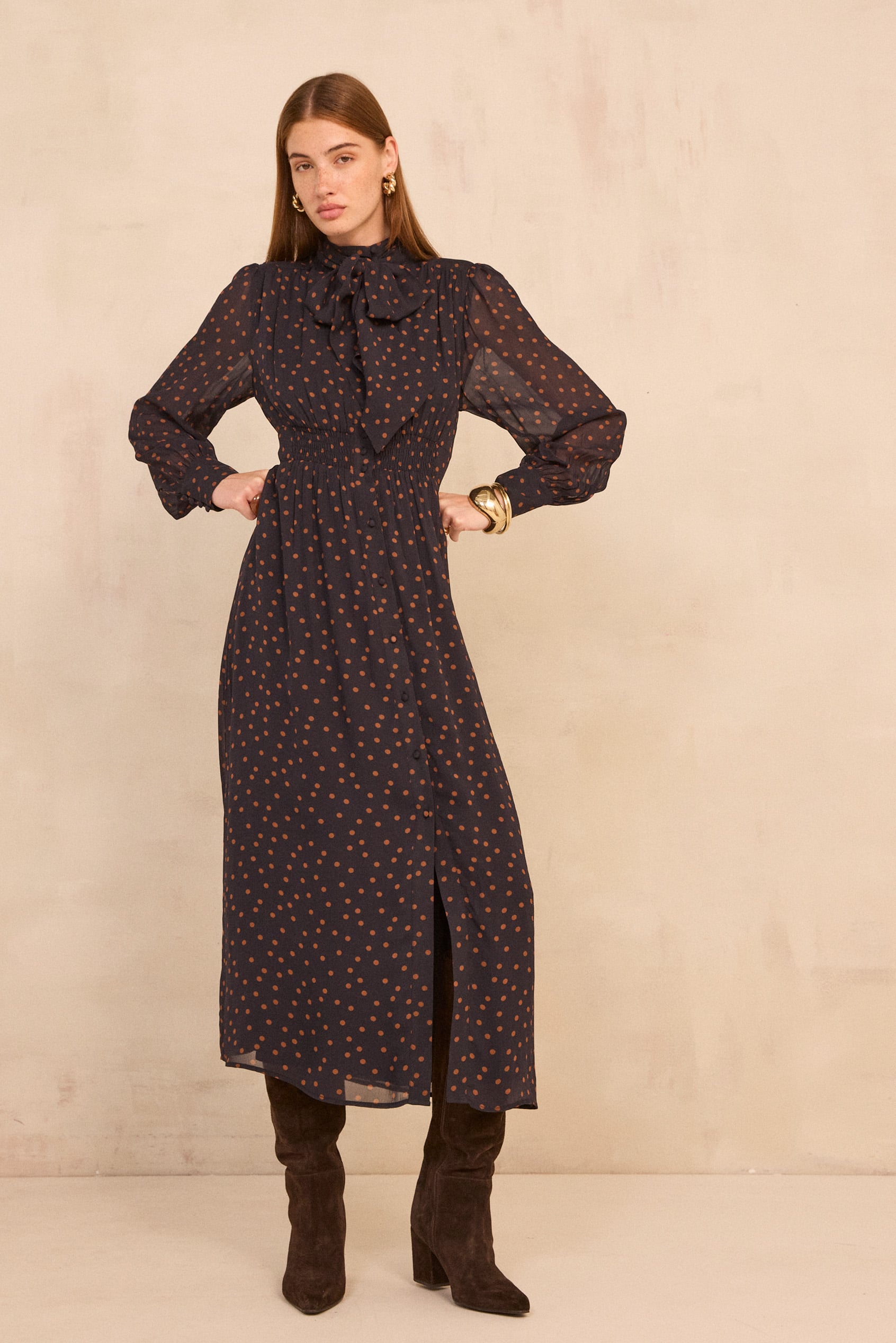 Brown suede boots with polka-dot tea dress